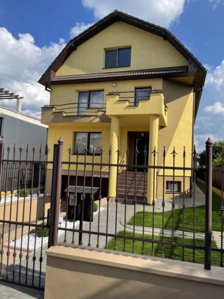 Casa individuala de vanzare in Gheorgheni, finisata, garaj dublu, zona de case