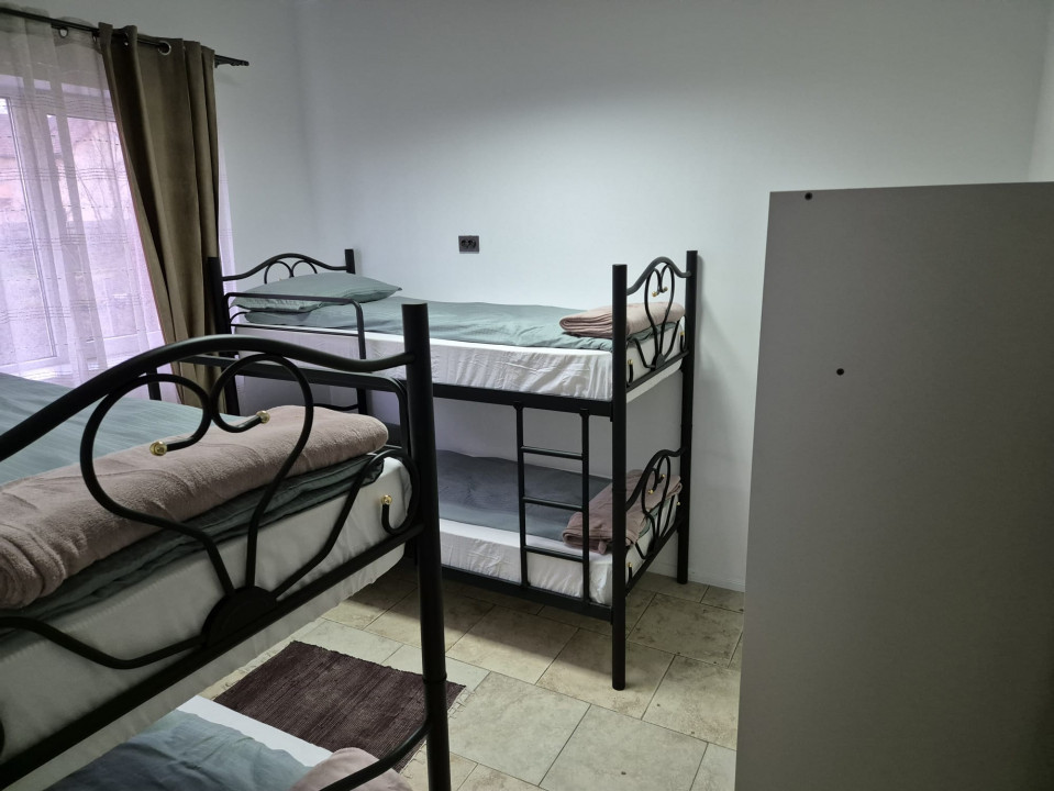 Casa formata din 2 apartamente in Jucu, spatiu comercial in acte