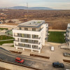 Acasă sau investiție? Apartament modern cu terasă generoasă în Baciu